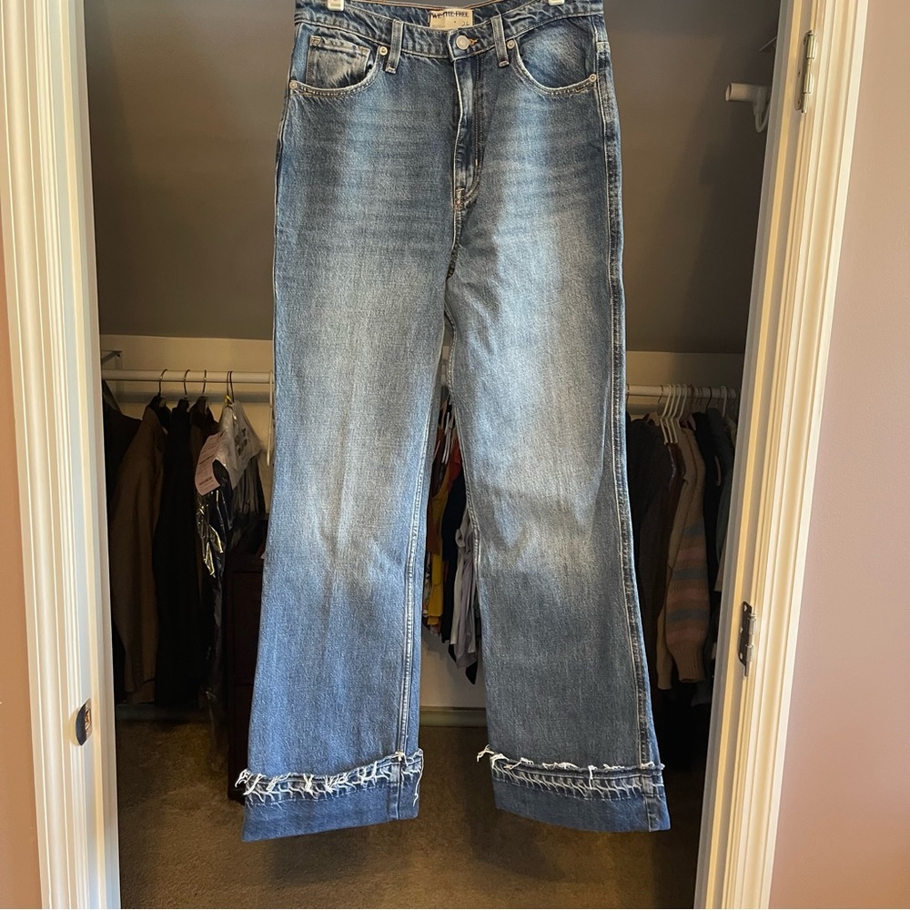 We the free medium blue jean cuff and seam down back. Size 26